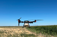 Crop spraying drone mid flight in Twin Falls ID