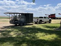 White truck hauling a trailer
